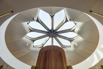 Sculptural floral skylight inside pavilion at old war office site