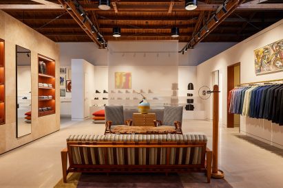 Seating area with clothing displays on either side