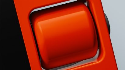 Close-up image of a scroll wheel on a bright orange gadget