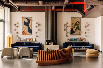 A variety of soft seating options in an industrial-style space