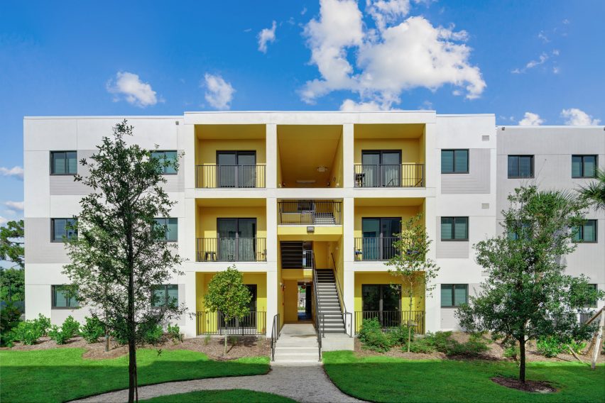 A building with yellow entrance
