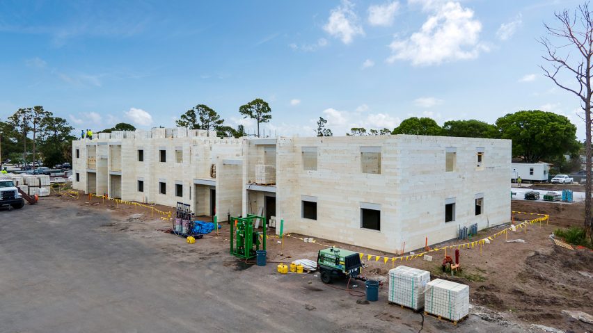 Construction of a building with bricks made of repurposed materials
