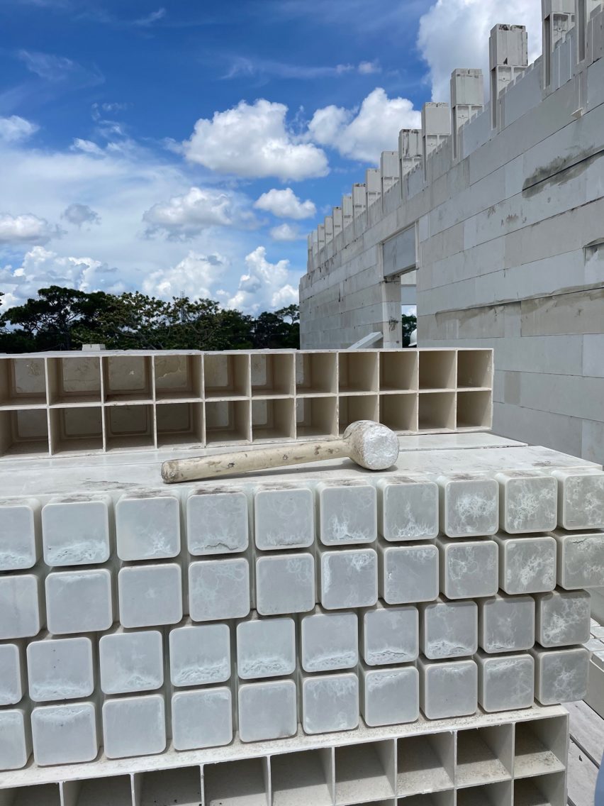 a mallet resting on bricks
