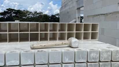 a mallet resting on bricks