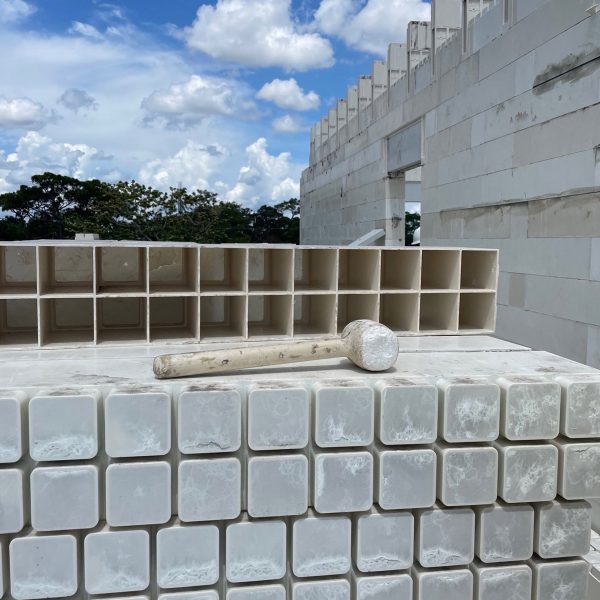 a mallet resting on bricks