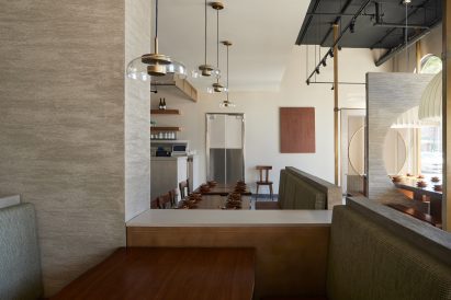 Plaster partition separating different sections of the restaurant