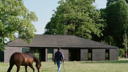 Charred timber clubhouse by DROO
