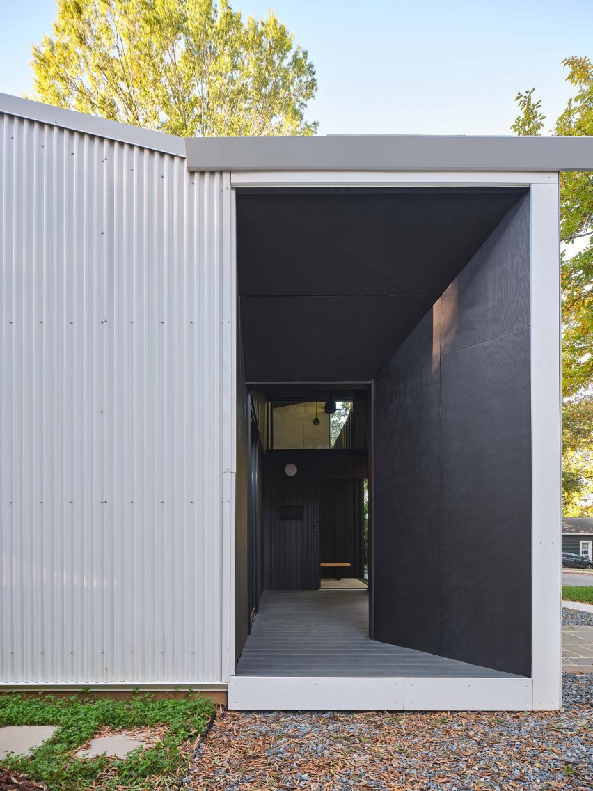An entryway clad in black