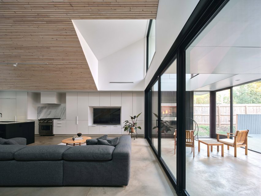 Room with wood clad ceiling