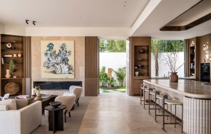 Kitchen area with white island