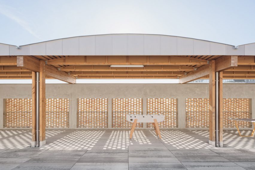 School playground with concrete structure and perforated brick walls