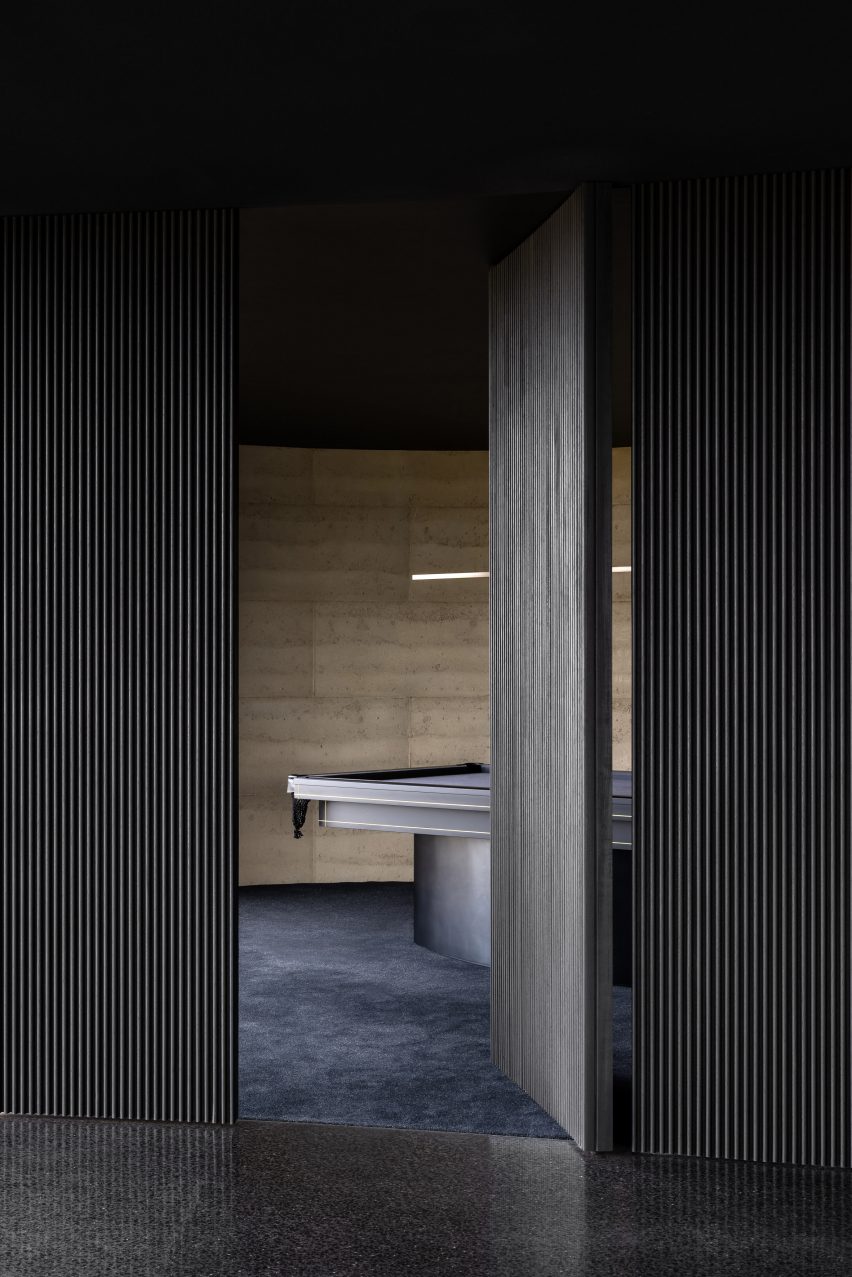 Black interior of Peninsula House by Wood Marsh