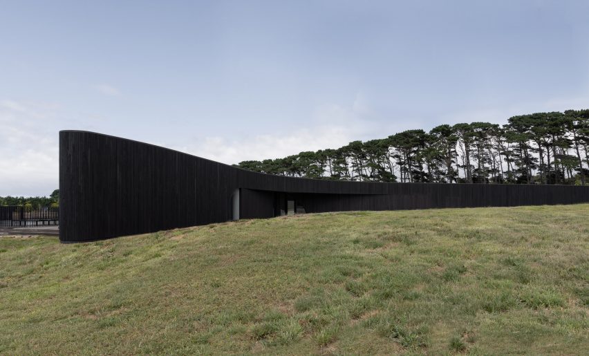 Charred timber exterior of Peninsula House by Wood Marsh