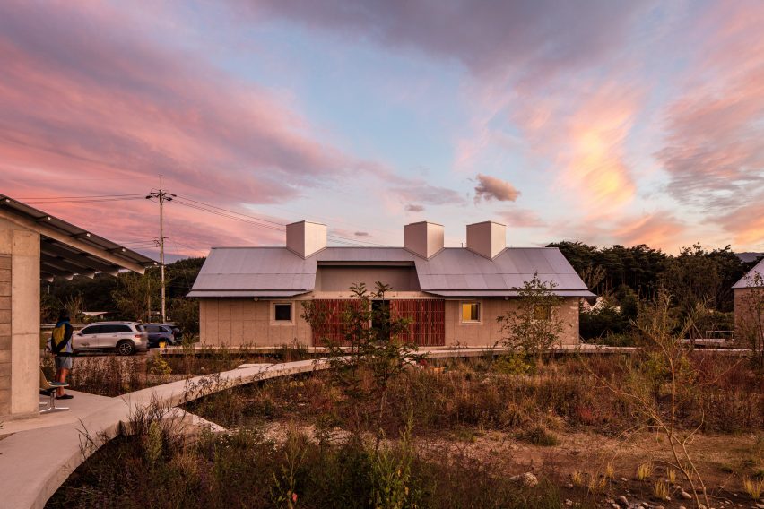 Concrete single storey house with a pitched roof