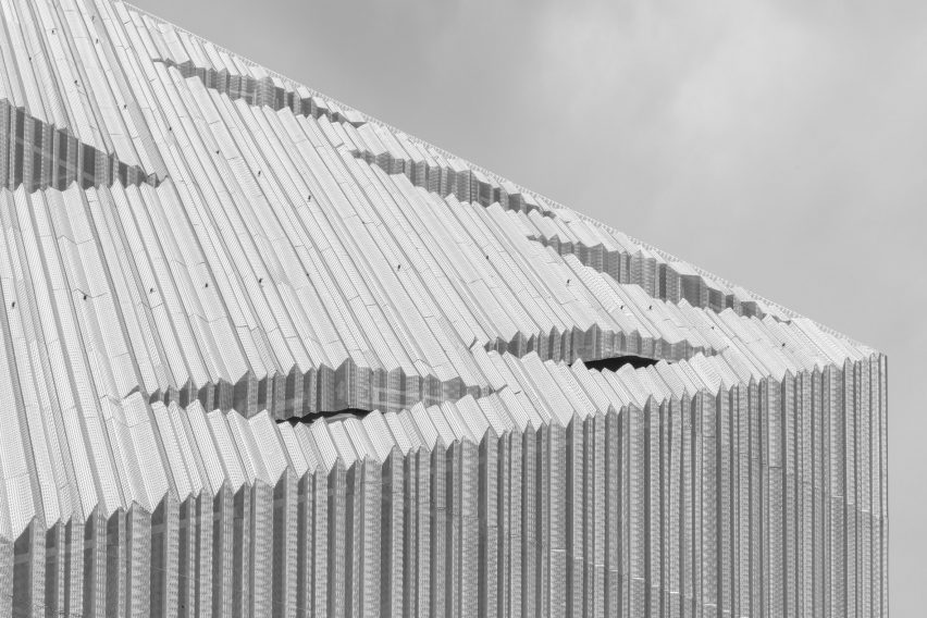 Pleated aluminium facade at the Bonfiglioli headquarters by Peter Pichler Architecture