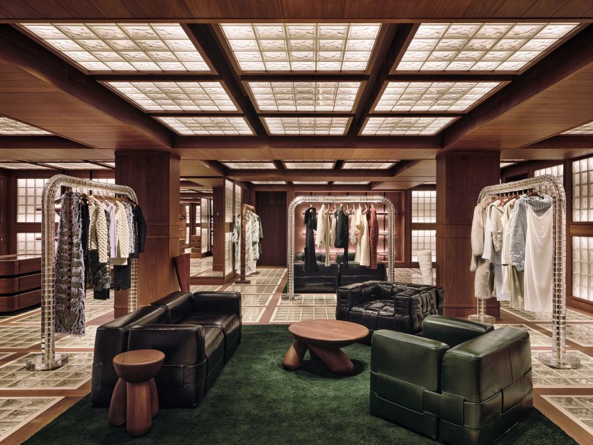 Chairs and sofas in the glass brick space