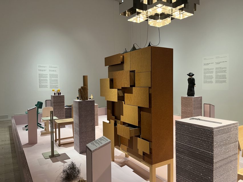 Stacked pink cardboard in exhibition space