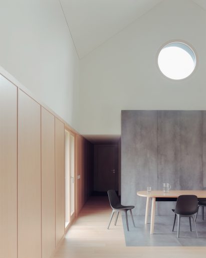 Double-height dining space within Casa 9