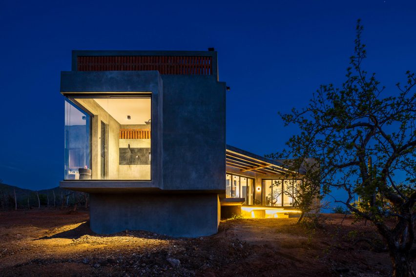 Concrete home at night