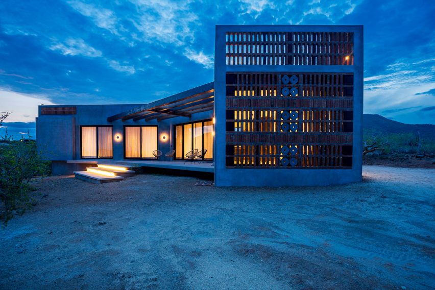 Concrete home in desert at night