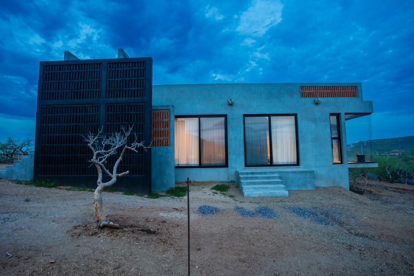 Concrete home at night