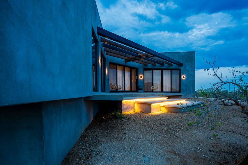 Concrete home with big windows