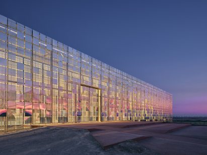 Close up of the facade of Central Control Building by Bilgin Architects at sunset