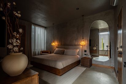 Low-lit bedroom at Casa Malbec