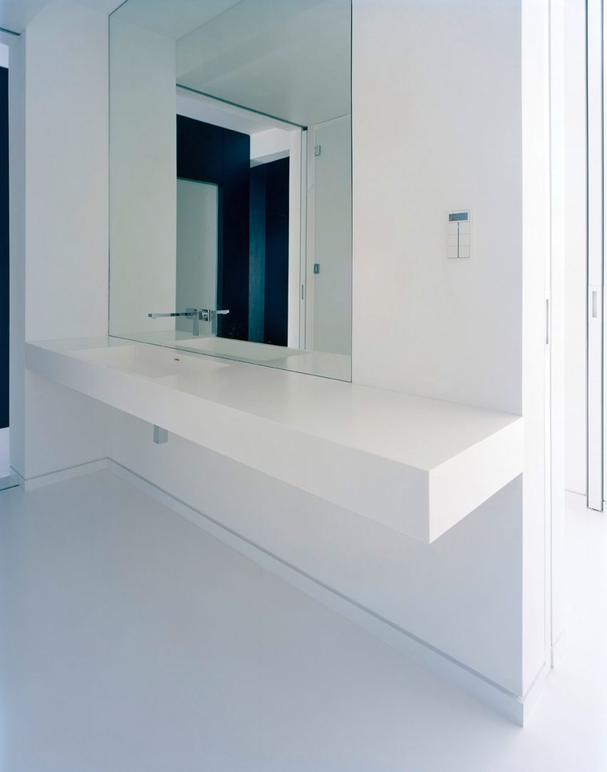 Corian Solid Surface range used across bathroom worktops in a Berlin apartment
