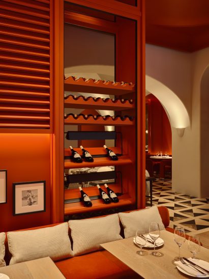 Dining room fully enveloped in a burnt orange hue