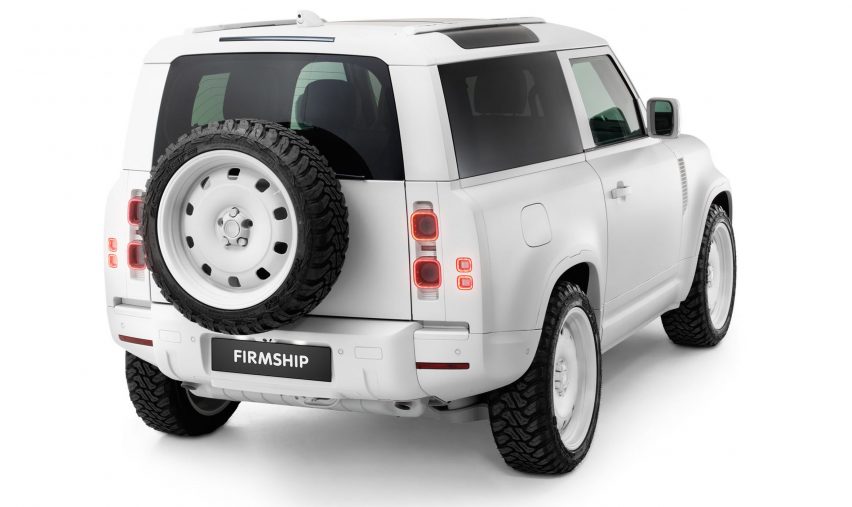 Rear ride view of the Firmship Land Rover Defender, showing a British Heritage spare wheel on the rear door