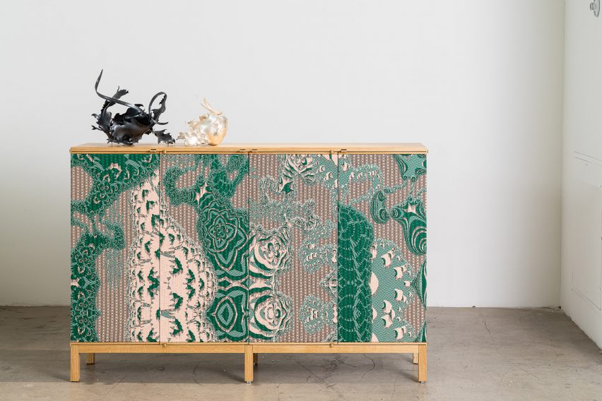 A cabinet with green and white pictorials