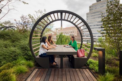 People talking at picnic bench