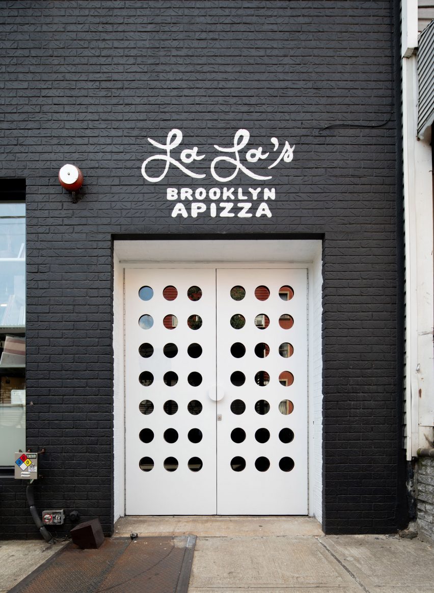White doors to pizza shop