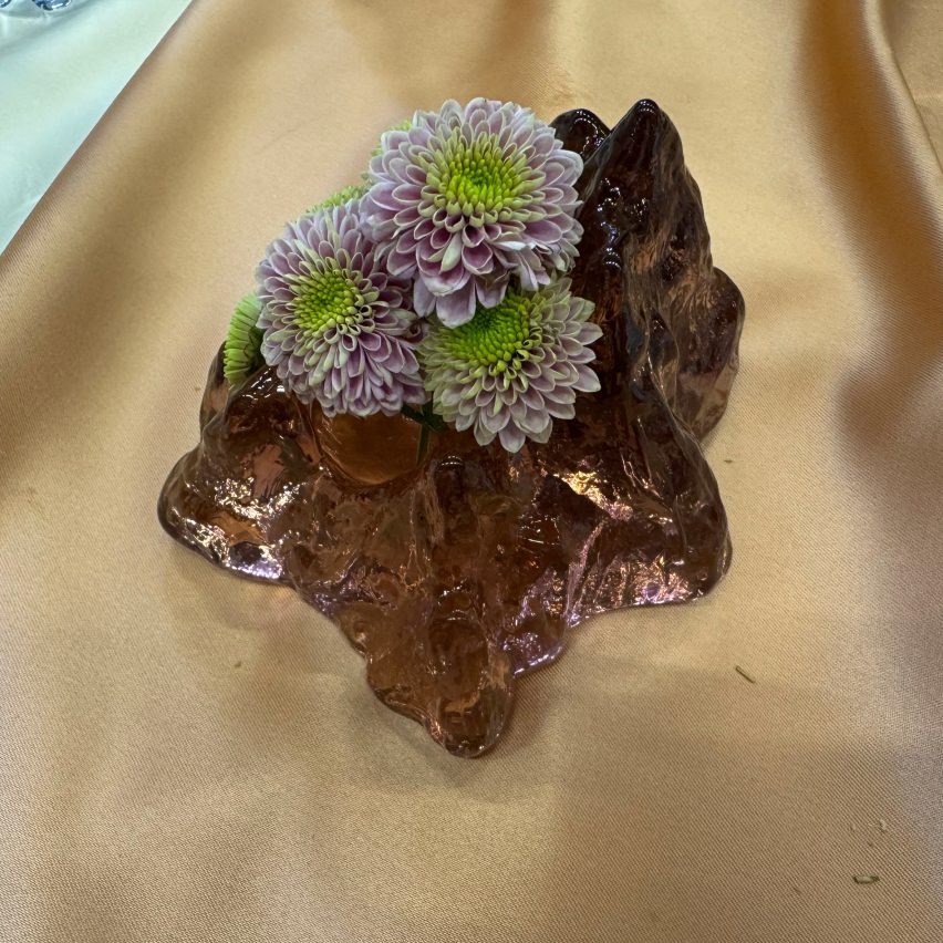 Glass candle holder used as vase