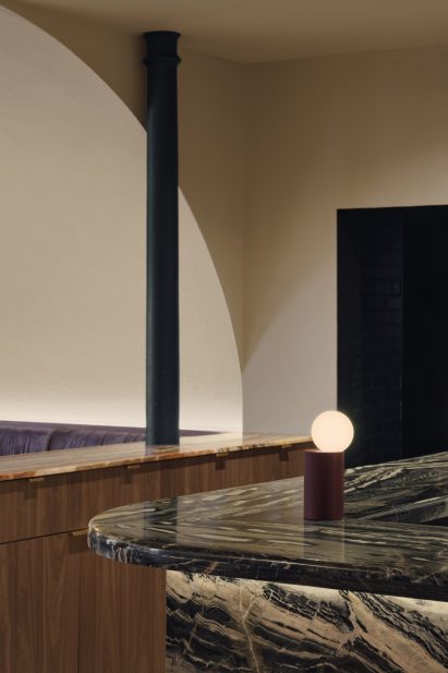 Bar made from a dramatic marble variety with streaks of teal, pistachio and cream colours