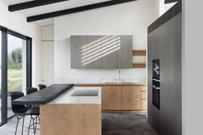 Kitchen area within House in the Fields by Stef Claes