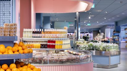 Pink curved counter inside Swedish supermarket ICA Stop