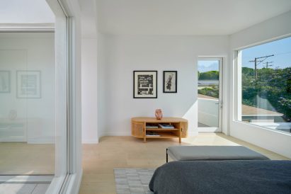 Bedroom with white walls and minimalist furniture