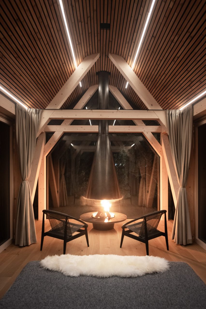 Interior of glass micro house on stilts by Jan Tyrpekl in Austria