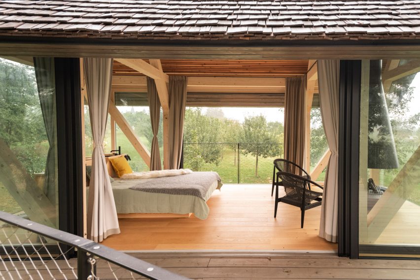 Interior of glass micro house on stilts by Jan Tyrpekl in Austria