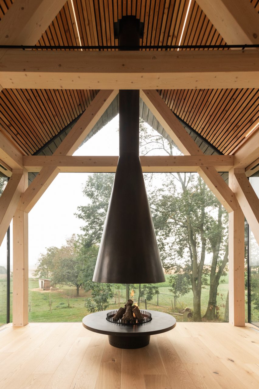 Interior of glass micro house on stilts by Jan Tyrpekl in Austria