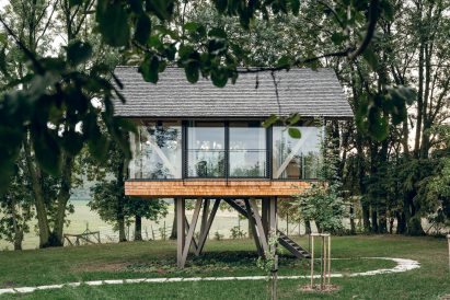Exterior of glass micro house by Jan Tyrpekl in Austria
