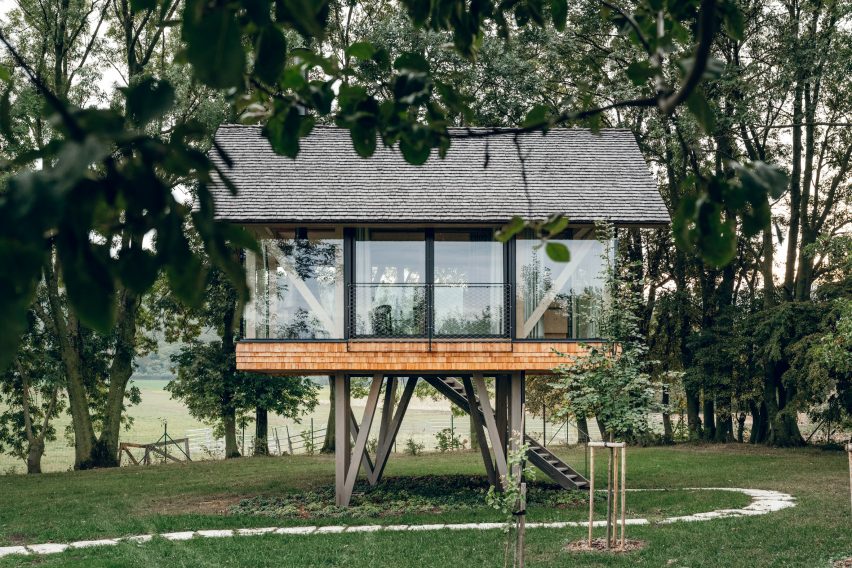 Exterior of glass micro house by Jan Tyrpekl in Austria