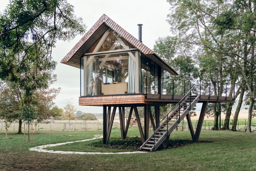 Exterior of glass micro house by Jan Tyrpekl in Austria