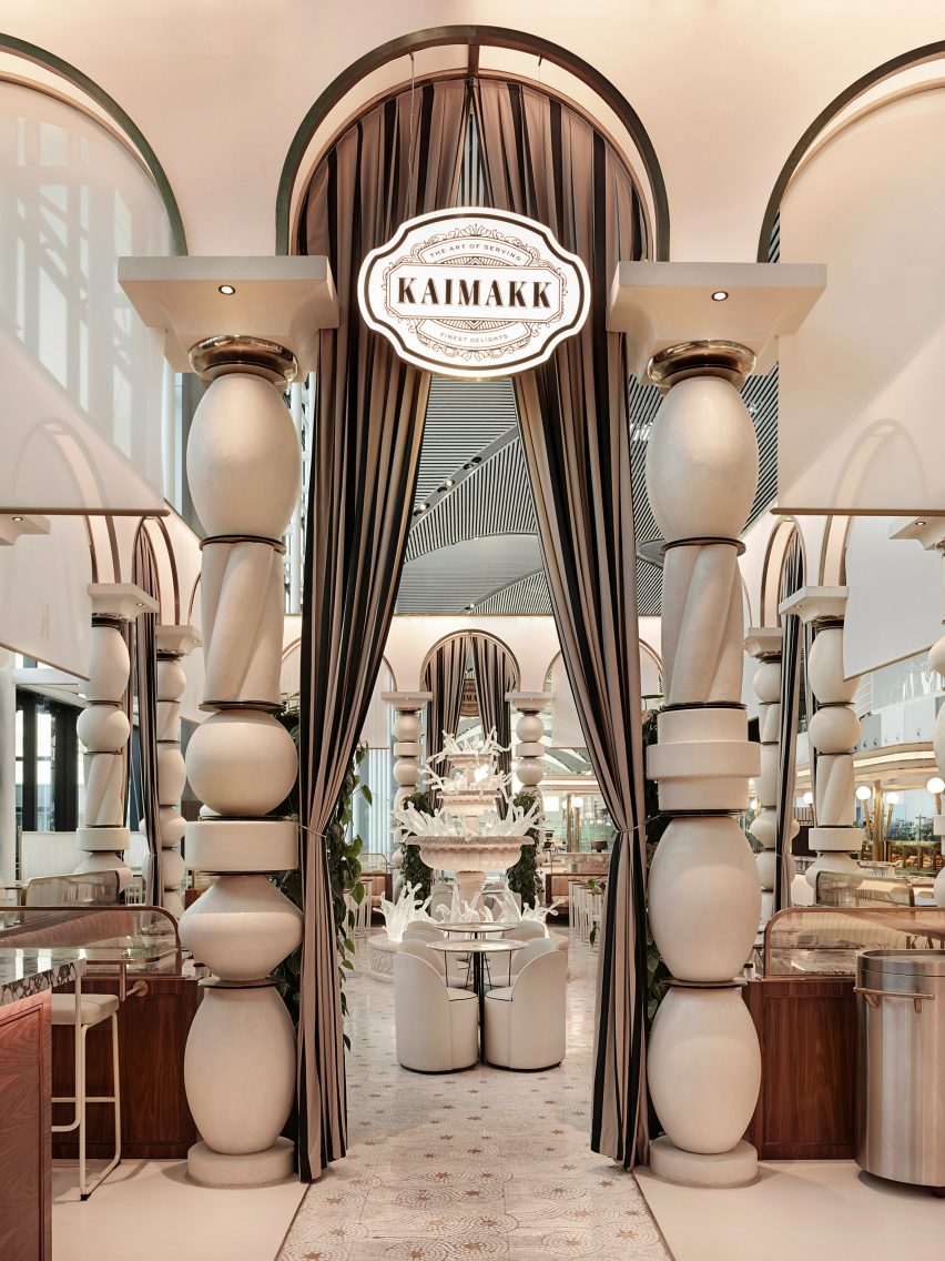 Columns, arch and drapes inside dining area Istanbul Airport