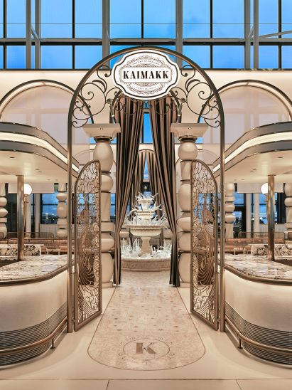Arched metal gates leading to fountain Kaimakk Istanbul Airport designed by Sanayi313