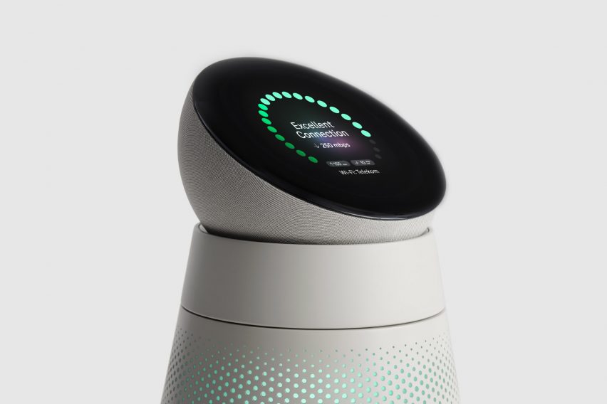Close-up photo of Layer's Concept Buddy prototype, showing a semispherical robot head with a screen showing lots of green lights lit up and text reading "excellent connection"