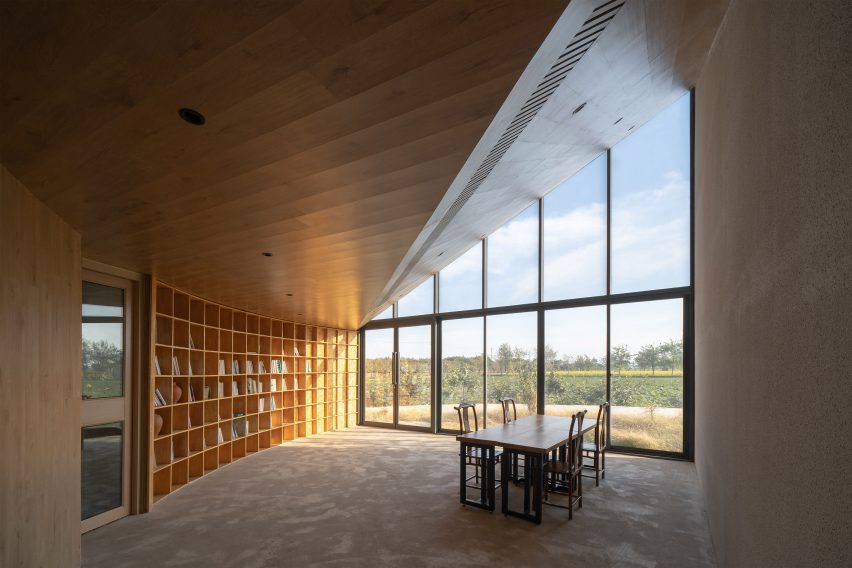 The Library in Ice-Chrysanthemum Field by Atelier Xi