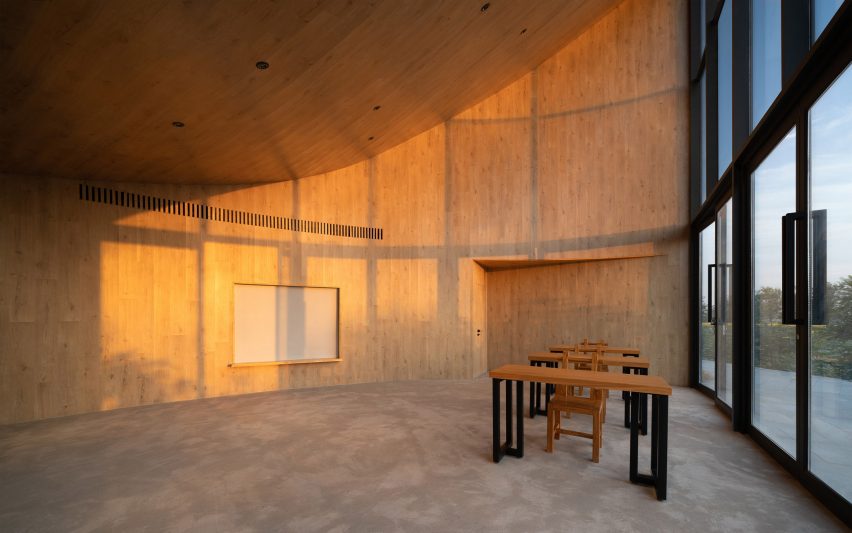 The Library in Ice-Chrysanthemum Field by Atelier Xi